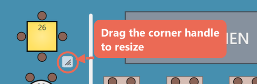 The resize handle at the corner of selected table 26