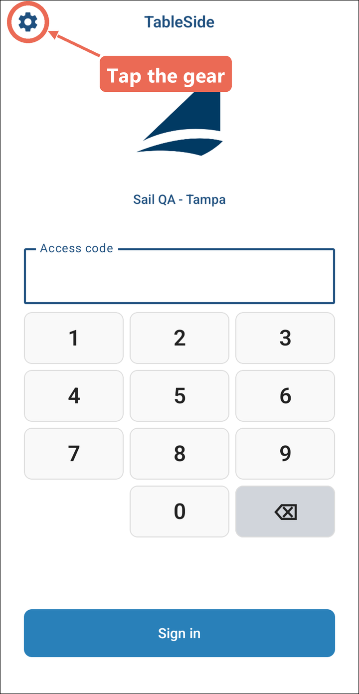 The handheld's login screen with the gear in the upper left corner marked